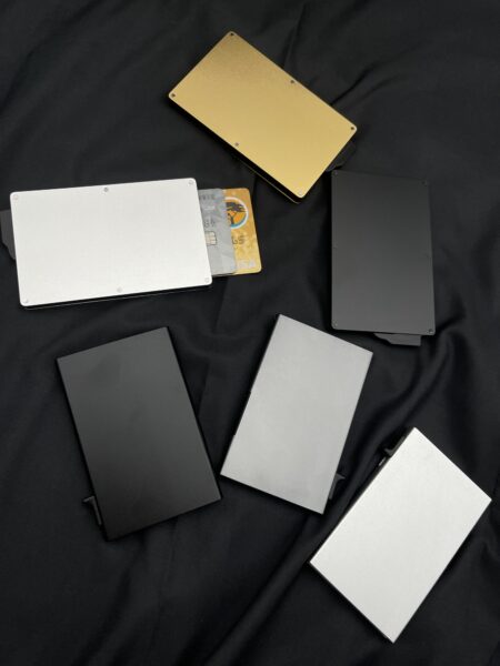 Assorted Aluminum Auto Pop-up card holder. Blanks N$200/1 engrave price depends on content.